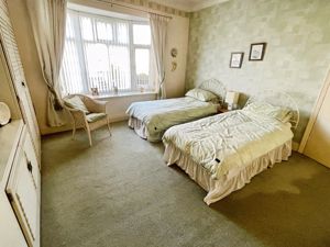 Bedroom One- click for photo gallery